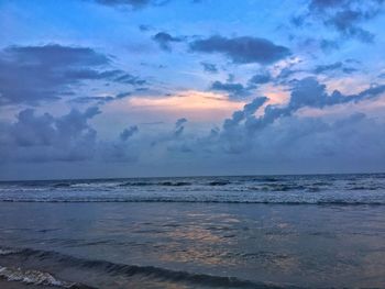 Scenic view of sea against sky at sunset