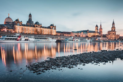 View of river with buildings in background