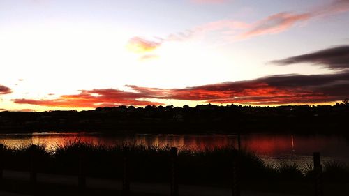 Scenic view of lake during sunset