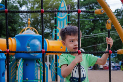 Boy playing at playground