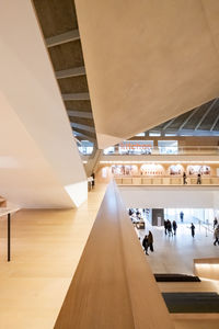 People in illuminated room