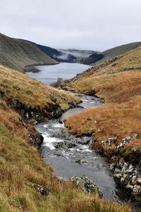 Scenic view of river against sky