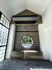 Reflection of building on glass window