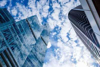 Low angle view of modern buildings against sky