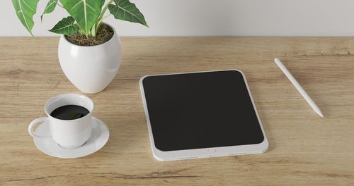 High angle view of coffee cup on table