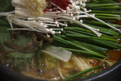 High angle view of meat and leaves