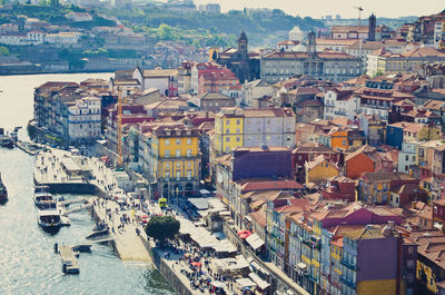 Aerial view of cityscape next to water