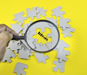 Close-up of information sign on yellow background
