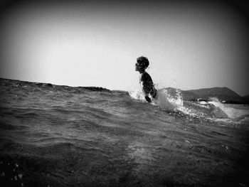 Woman standing in water