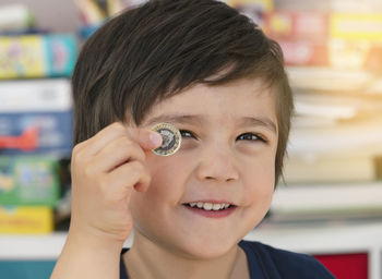 Close-up portrait of smiling boy