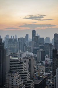 Cityscape against sky during sunset