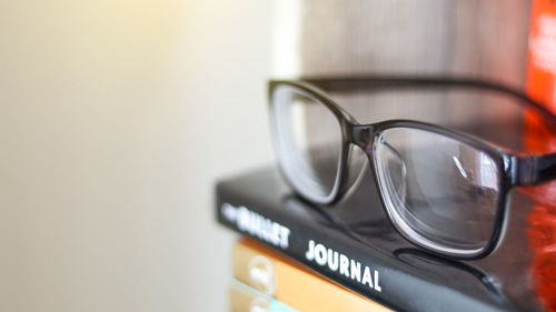 Close-up of eyeglasses on table
