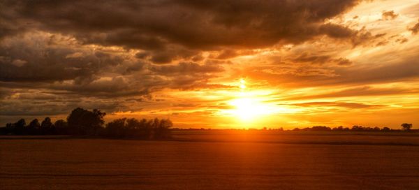 Scenic view of sunset over landscape