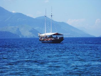 Sailboat sailing in sea