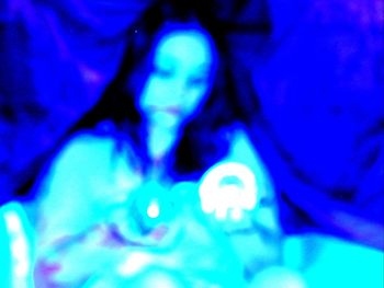 Full frame shot of illuminated blue light painting