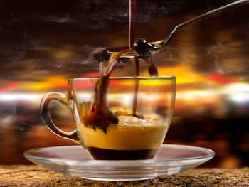 Close-up of coffee cup on table