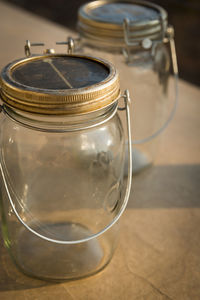 Close-up of glass of jar on table
