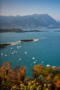 Scenic view of sea with mountains in background