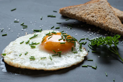 Close-up of bread in plate on table