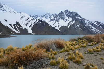 Scenic view of snowcapped mountains against sky