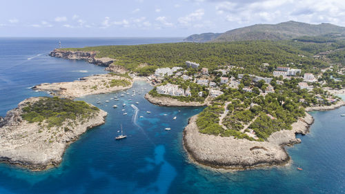 High angle view of sailboats and sea against sky