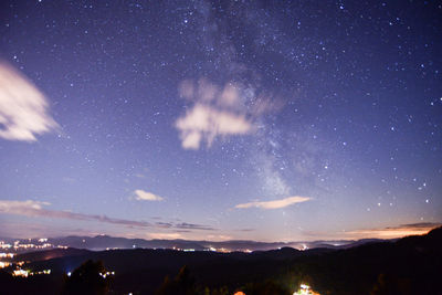 Scenic view of star field against sky at night