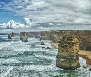 Scenic view of sea against cloudy sky