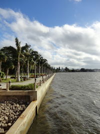 Scenic view of sea against cloudy sky