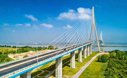 Bridge over sea against sky