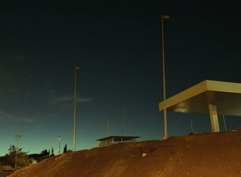 View of street light against blue sky