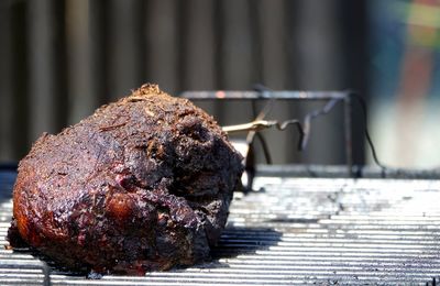 Close-up of meat on barbecue grill