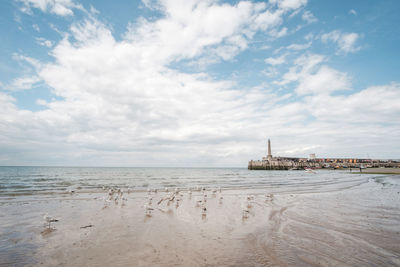 Scenic view of beach against sky