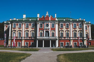 Facade of historic building against clear blue sky