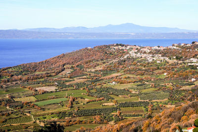 High angle view of agricultural landscape against sky