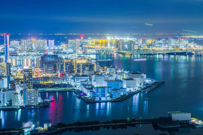 High angle view of illuminated cityscape at night