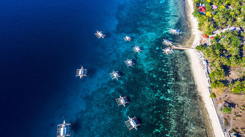 High angle view of sailboat on sea shore