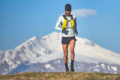 Man travel athlete in the mountains in high altitude