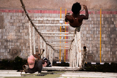 High angle view of men on scaffolding