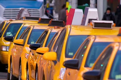 Close-up of yellow traffic in row