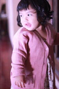 Portrait of cute girl at home