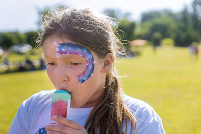 Portrait of a girl holding ice cream