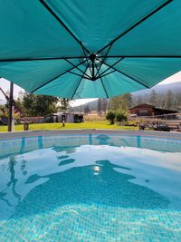 Swimming pool against blue sky