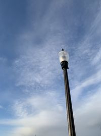 Low angle view of street light against sky