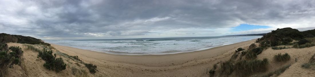 Panoramic view of beach against sky