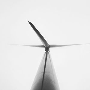 Low angle view of wind turbine against sky