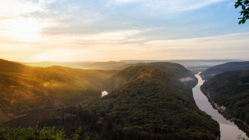 High angle view of mountains against sky during sunset