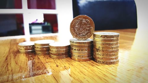 Close-up of coins on table