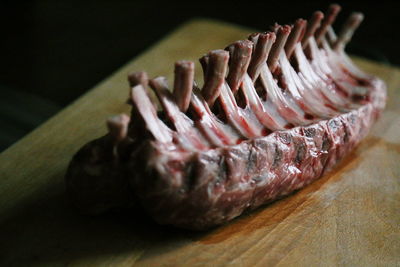 Close-up of meat on cutting board