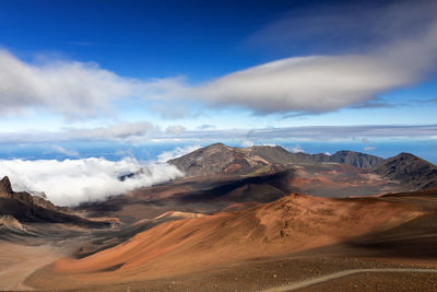 Panoramic view of volcanic landscape against sky