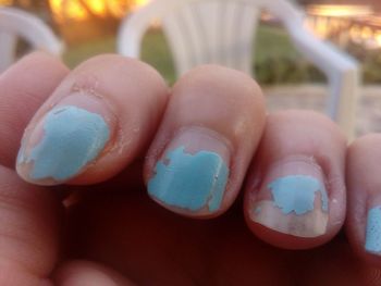 Close-up of hand holding ice cream